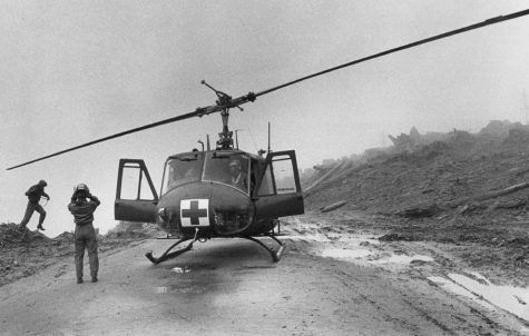 Members of a helicopter crew on a search and rescue mission look for survivors after the eruption of Mount St. Helens.
(Barry Wong / The Seattle Times 1980)