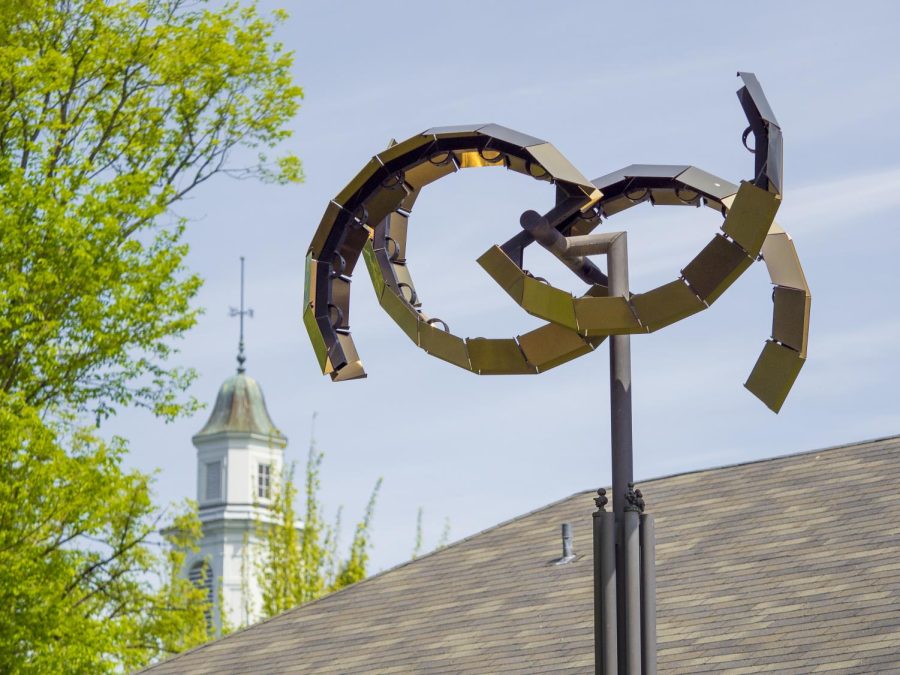 The Winds of Friendship sculpture, with Bliss Hall in the background.