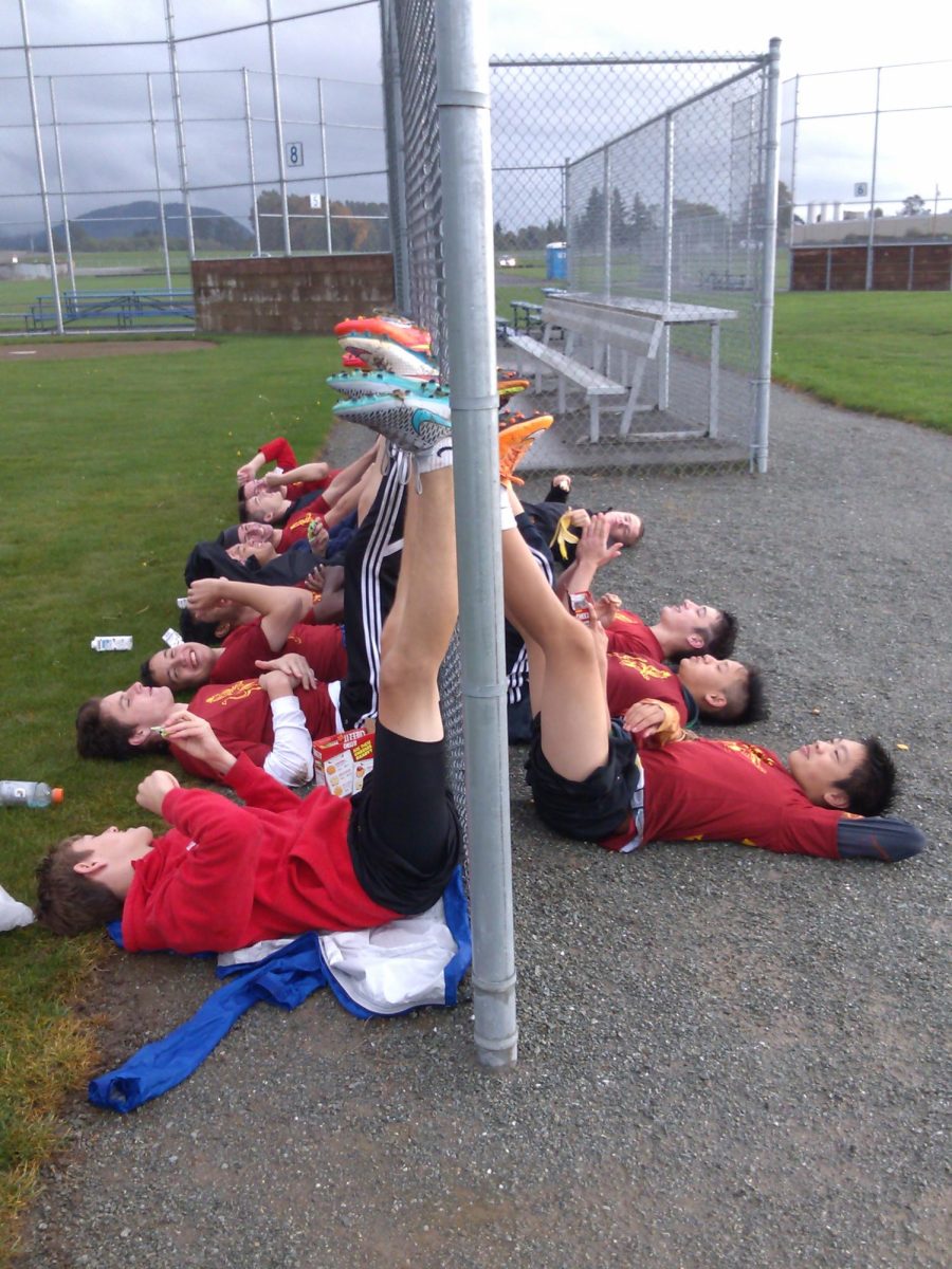 Lakesides 2015 Ultimate team stretching during practice.