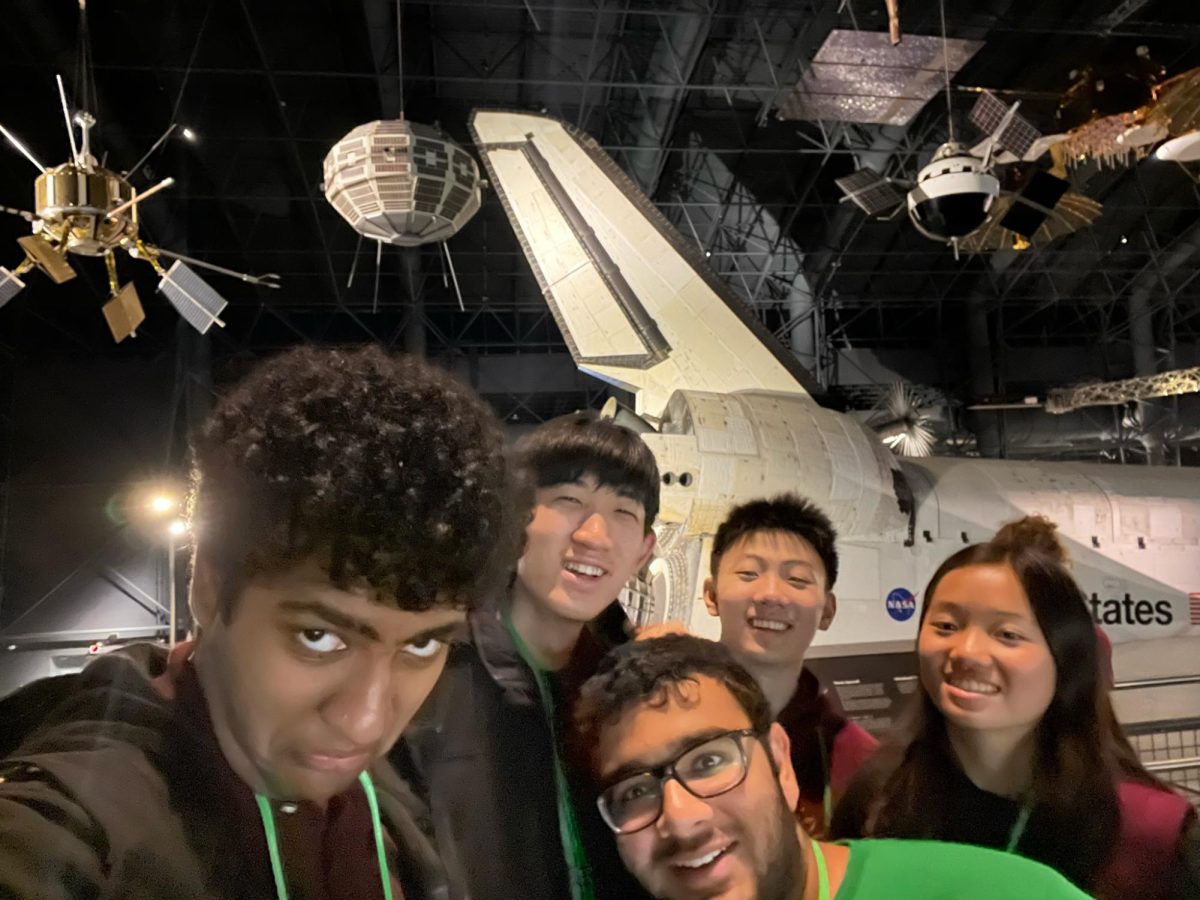 The SciBowl team with the Space Shuttle.